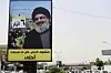 Plakater med portrettet til Hizbollah-sjef Hassan Nasrallah langs veien sør i Libanons hovedstad Beirut, 4. mai 2018. Scanpix/AFP.