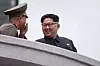 Den nordkoreanske lederen Kim Jong-Un (t.h.) truet i sin nyttårstale med at landet ville teste interkontinentale ballistiske missil i løpet av året. Arkivfoto. Foto: Ed Jones / AFP