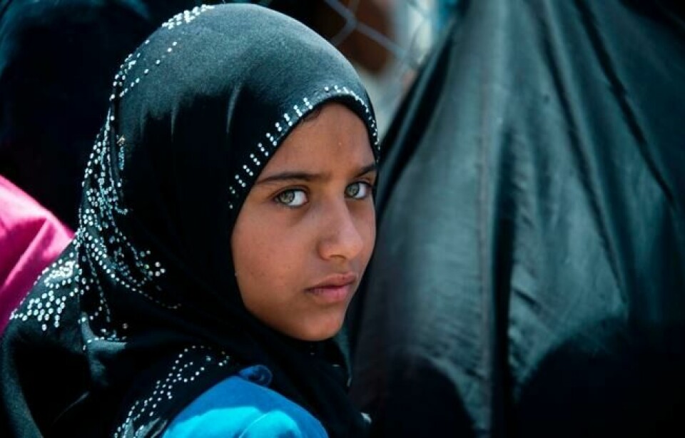 En irakisk jente i en leir for internt fordrevne i Hammam al-Alil 14. mai. Hun har flyktet fra Vest-Mosul på grunn av sammenstøtene mellom regjeringsstyrker og IS. Scanpix/AFP PHOTO/FADEL SENNA. En irakisk jente i en leir for internt fordrevne i Hammam al-Alil 14. mai. Hun har flyktet fra Vest-Mosul på grunn av sammenstøtene mellom regjeringsstyrker og IS. Scanpix/AFP PHOTO/FADEL SENNA.