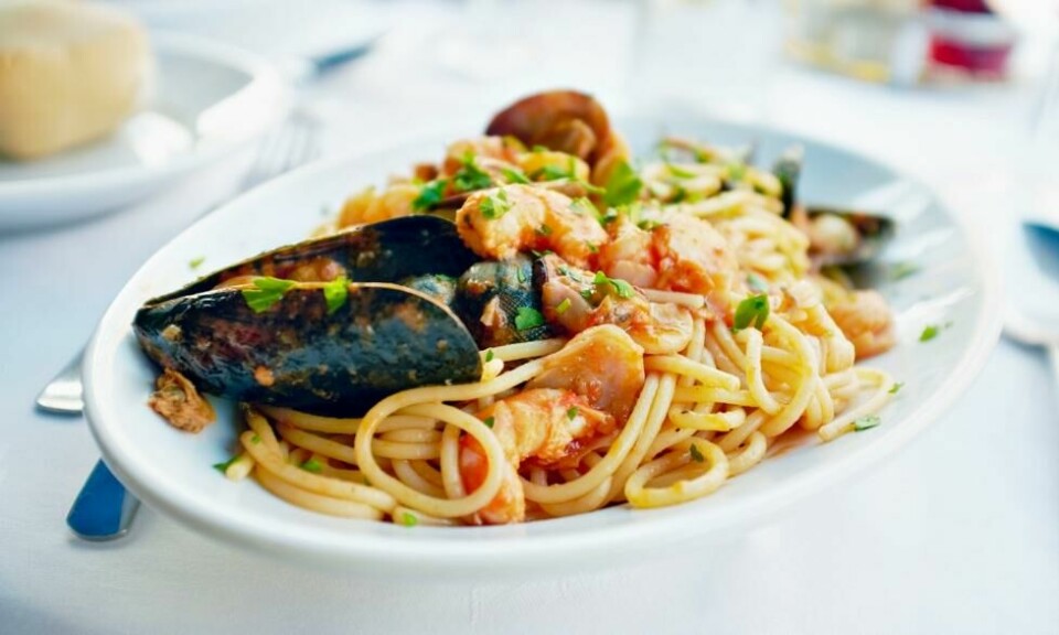 Fersk sjømat-pasta i Italia - spaghetti, muslinger, reker og blekksprut. Fersk sjømat-pasta i Italia - spaghetti, muslinger, reker og blekksprut. Foto: Colourbox