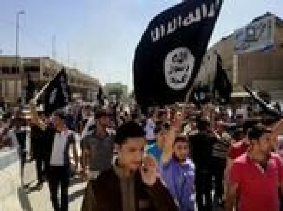 Arkivfoto fra 16. juni 2014: demonstranter med IS-flagg i Mosul. Scanpix/AP. Arkivfoto fra 16. juni 2014: demonstranter med IS-flagg i Mosul. Scanpix/AP.