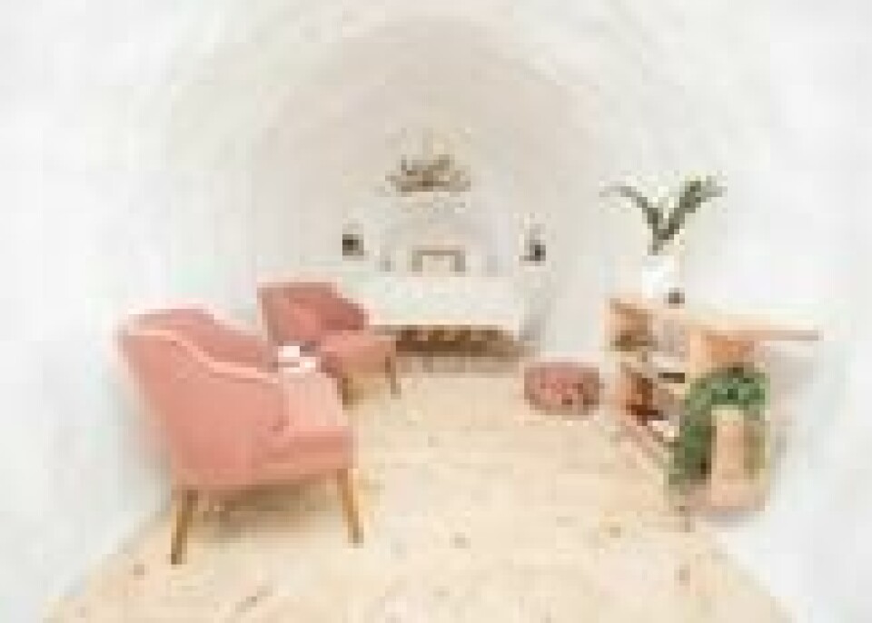 På innsiden av poteten finner du et lyst og trivelig hotellrom med dobbeltseng og minibar. På innsiden av poteten finner du et lyst og trivelig hotellrom med dobbeltseng og minibar. Foto: Airbnb/Idaho Potato Commission