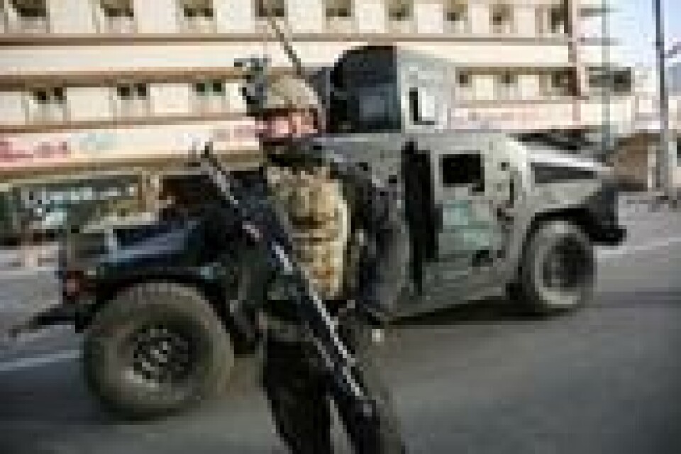 Det irakiske innenriksdepartementet utplasserte spesialpoliti i Kirkuk under folkeavstemningen mandag. Scanpix/AFP. Det irakiske innenriksdepartementet utplasserte spesialpoliti i Kirkuk under folkeavstemningen mandag. Scanpix/AFP.