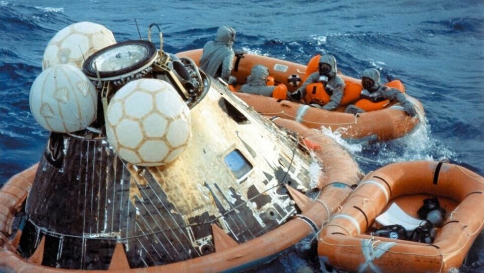 24 juli 1969: Løytnant og falskjermhopper Clancey Hatleberg sammen med Apollo 11-astronautene Neil Armstrong, Michael Collins og Buzz Aldrin i redingsbåten i Stillehavet tilbakekomsten fra Månen. 24 juli 1969: Løytnant og falskjermhopper Clancey Hatleberg sammen med Apollo 11-astronautene Neil Armstrong, Michael Collins og Buzz Aldrin i redingsbåten i Stillehavet tilbakekomsten fra Månen. Foto: Ho / Nasa/AFP/NTB