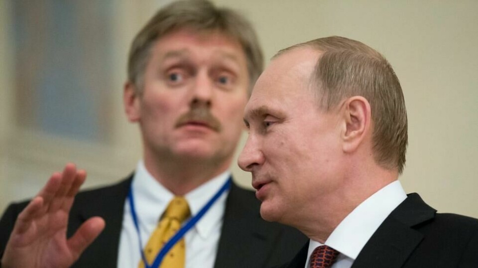 Kreml-talsmann Dmitrij Peskov og president Vladimir Putin avbildet sammen i 2015.
