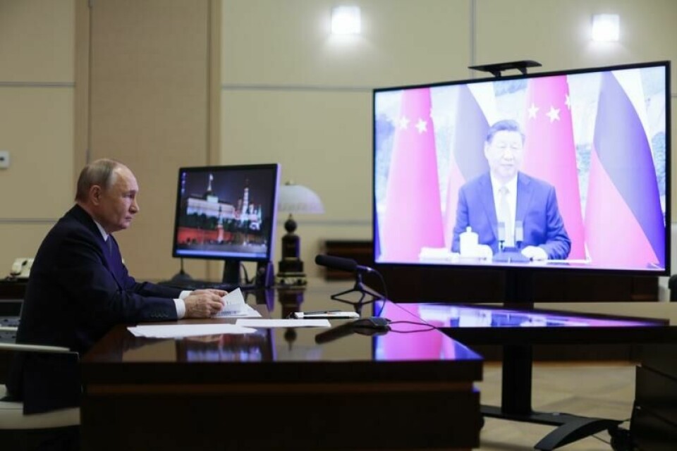 Russlands president Vladimir Putin i et videomøte med Kinas president Xi Jinping.