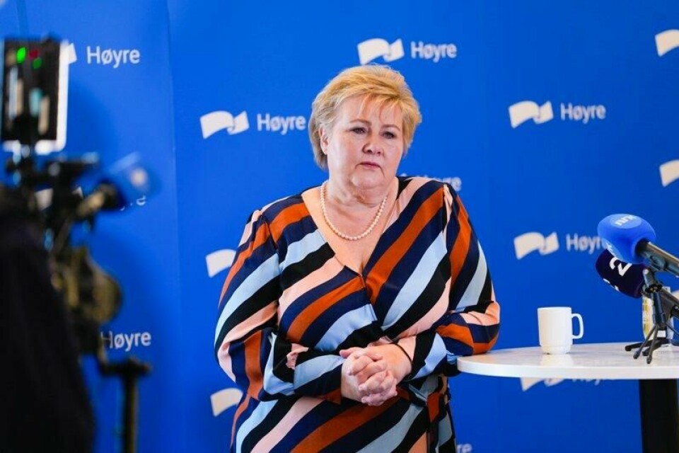 Høyre-leder Erna Solberg høster kraftige reaksjoner på sin kritikk mot regjeringen for høye norsk tollsatser.