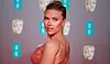 Scarlett Johansson er nominert til både beste hovedrolle og beste birolle under årets Oscar-utdeling. Her er hun på vei inn til utdelingen av BAFTA i London 2. februar. Foto: Tolga Akmen / AFP