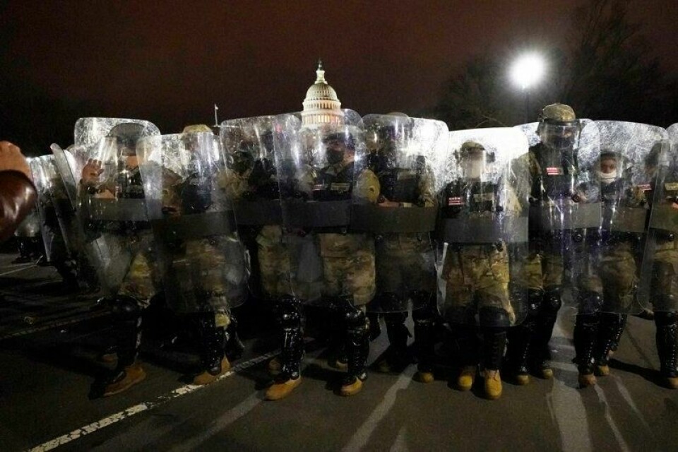 Medlemmer av DC National Guard står utenfor den amerikanske hovedstaden, 6. januar 2021, etter stormingen av Kongressen. (AP Photo/Julio Cortez, fil) Medlemmer av DC National Guard står utenfor den amerikanske hovedstaden, 6. januar 2021, etter stormingen av Kongressen. (AP Photo/Julio Cortez, fil) Foto: Julio Cortez/NTB