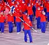Emil Hegle Svendsen er flaggbærer sammen med andre norske utøvere, trenere og støtteapparat under åpningsseremonien til vinter-OL på Pyeongchang Olympic Stadium i Pyeongchang. Foto: Terje Pedersen / NTB scanpix