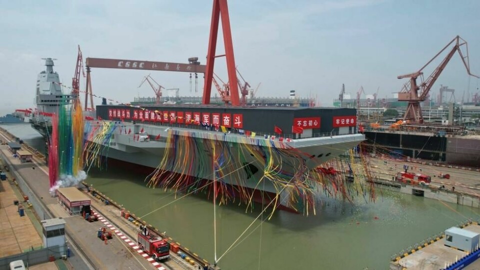 Her blir Kinas nye stolthet, Fujian, sjøsatt. Her blir Kinas nye stolthet, Fujian, sjøsatt. Foto: Li Gang / Xinhua/AP