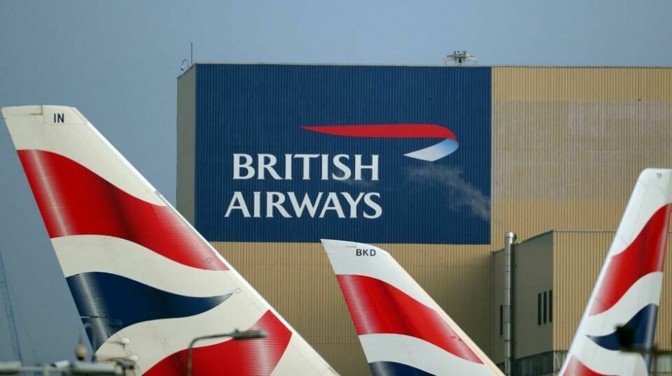 British Airways-logoer på halefinner på Heathrow lufthavn i London. Illustrasjonsfoto.