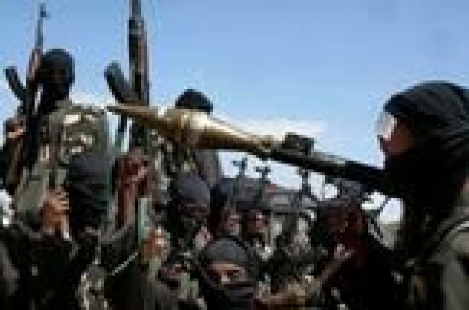 Harakat al-Shabaab al-Mujahidin er en radikal islamistisk bevegelse som har sverget lojalitet til al-Qaida. Gruppen står bak flere store terrorangrep i Øst-Afrika, og skal ha styrket seg etter at den omstridte havneavtalen ble annonsert 1. januar i år. Arkivfoto. Harakat al-Shabaab al-Mujahidin er en radikal islamistisk bevegelse som har sverget lojalitet til al-Qaida. Gruppen står bak flere store terrorangrep i Øst-Afrika, og skal ha styrket seg etter at den omstridte havneavtalen ble annonsert 1. januar i år. Arkivfoto. Foto: Farah Abdi Warsameh / AP / NTB