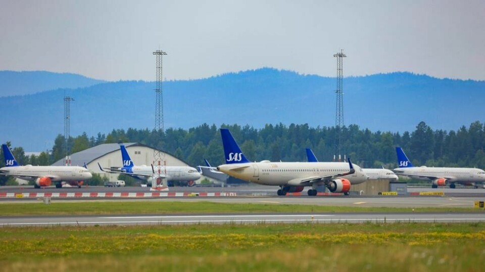 Fra fredag 23. august kan de bli streik blant kabinansatte i SAS. Dermed kan en rekke SAS-fly bli stående på bakken. Foto: Tor Erik Schrøder / NTB
