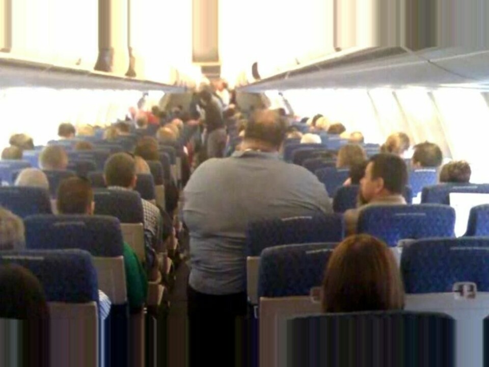 Ekstra store passasjerer kan føre til problemer av forskjellig slag ombord i fly. Dette bildet ble tatt for 15 år siden av en kabinansatt under en flytur ombord i et American Airlines-fly og lagt ut på Flightglobal.com skriver NBC. Ekstra store passasjerer kan føre til problemer av forskjellig slag ombord i fly. Dette bildet ble tatt for 15 år siden av en kabinansatt under en flytur ombord i et American Airlines-fly og lagt ut på Flightglobal.com skriver NBC. Foto: NBC News