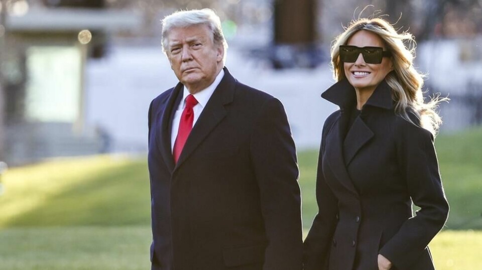 President Donald Trump og førstedame Melania Trump går på sørplenen i Det hvite hus 23. desember 2020. Illustrasjonsbilde.