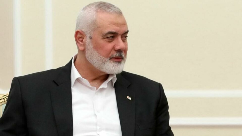 Hamas' politiske leder Ismail Haniyeh avbildet under et møte med Irans president Masoud Pezeshkian i Teheran tirsdag 30. juli, få timer før han ble drept. Foto: Irans presidentkontor / AP / NTB