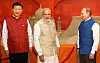 Indiske statsminister Narendra Modi, i midten, russisk president Vladimir Putin, til høyre, og kinesisk president Xi Jinping før en middag arrangert av Modi for ledere av BRICS-nasjonene i Goa, India, 15. oktober 2016. Foto: AP Photo/Manish Swarup