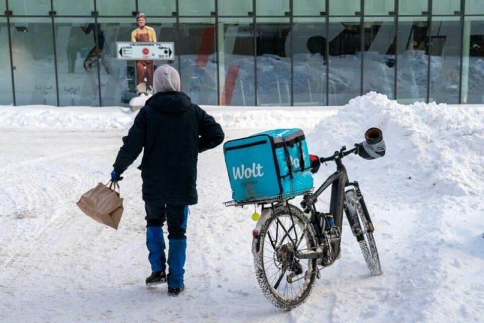 Et Wolt-bud på sykkel i snøværet i Oslo. Arkivfoto: Gorm Kallestad / NTB
