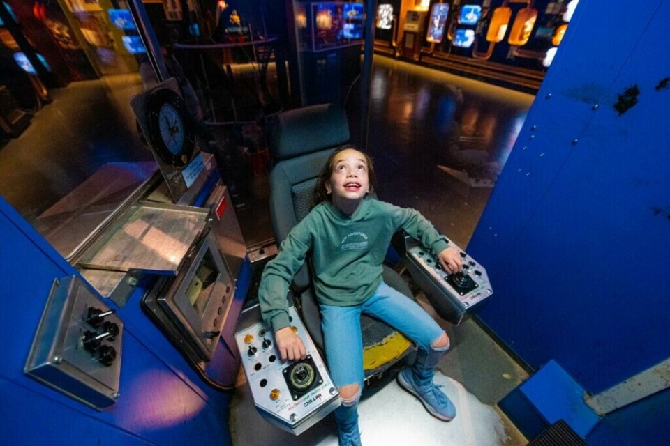 Teknisk museum ble i 2021 kåret til «Oslos beste opplevelse for barn» i Aftenposten. (Foto: Teknisk Museum/ Lars Opstad ) Bilde av barn i simulator på Teknisk Museum.